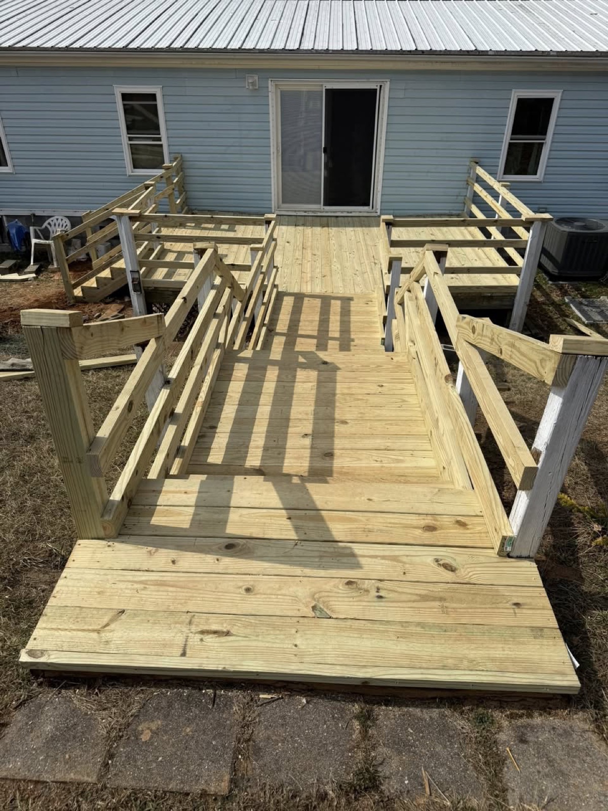 Custom deck with wheelchair ramp in Hillsville, VA — Perfect Build Solutions